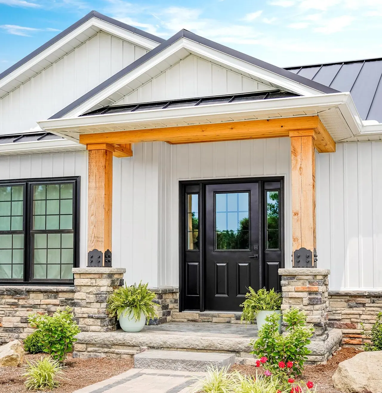 Modern home with a wood-accent entry door